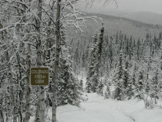 Sign to Colorado Creek cabin